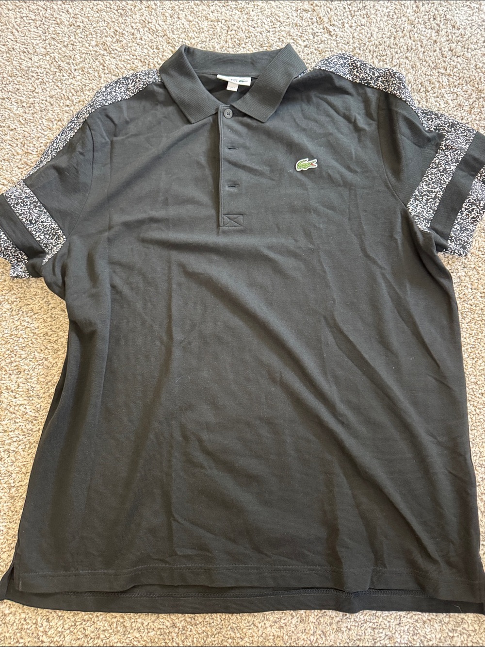 Lacoste Black Polo with Speckled Sleeve Details